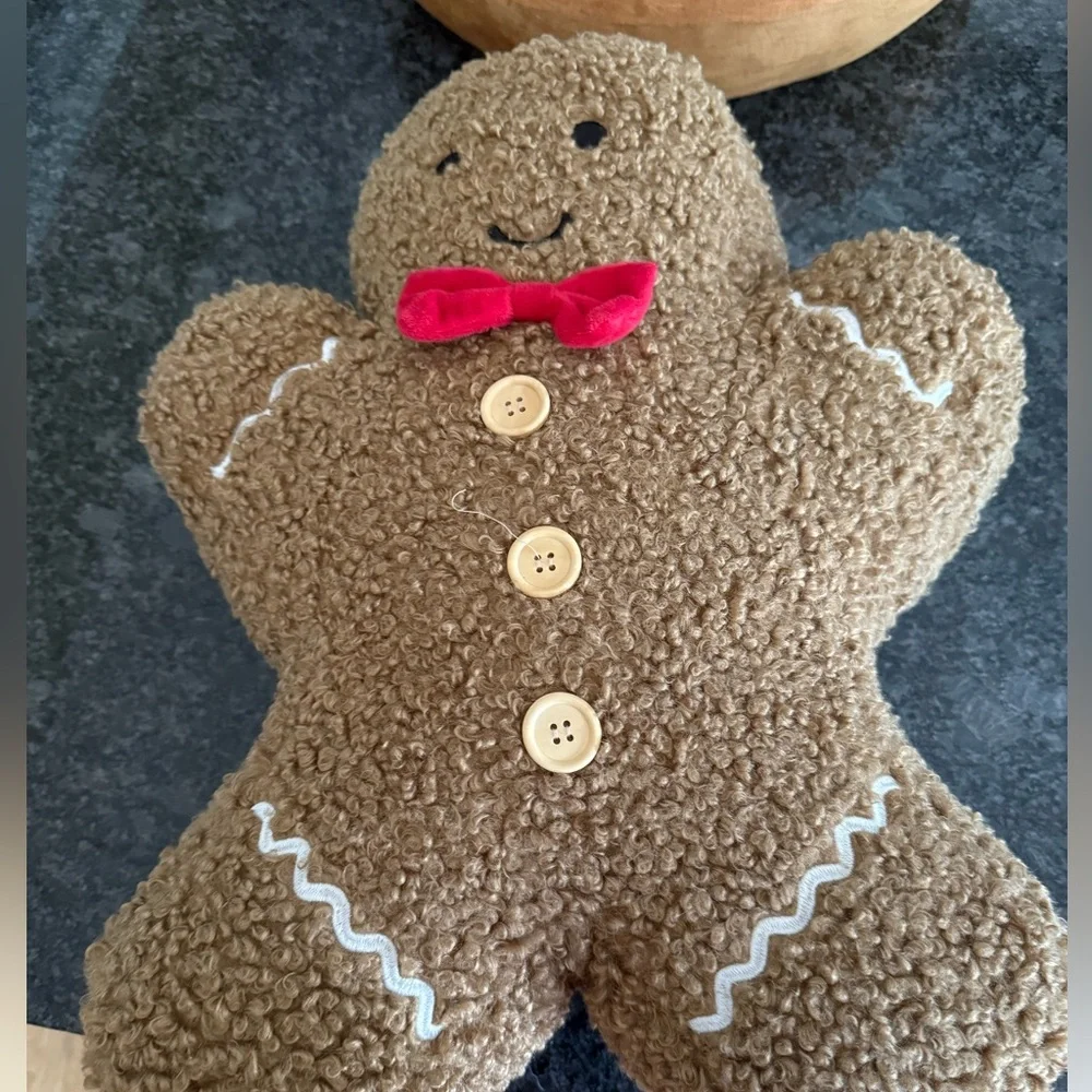 cupcakes & cashmere Brown Gingerbread Plush Holiday Pillow with Red Bow